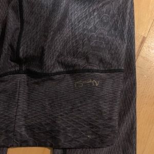 Deep purple and black snakeskin leggings